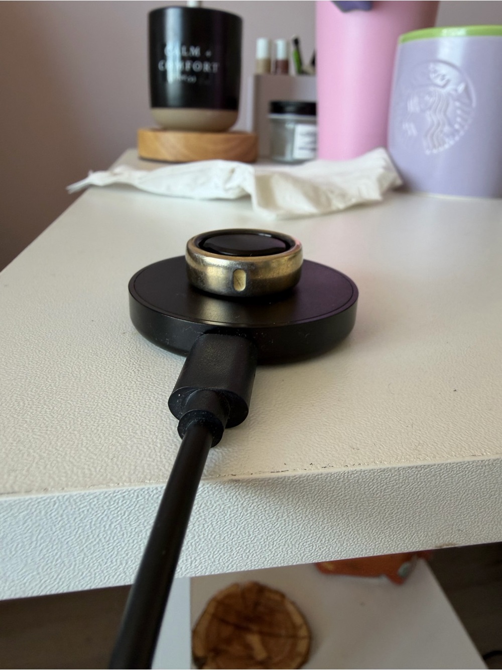 Oura Ring (gen 3) in Gold with Black Charger